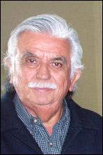 Manuel Carlos headshot