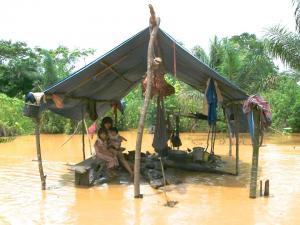 A Tsimane mother and her two children. Photo by Benjamin Trumble.